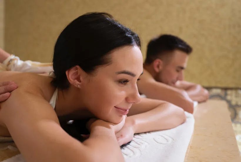 Couple-receiving-massage-at-spa