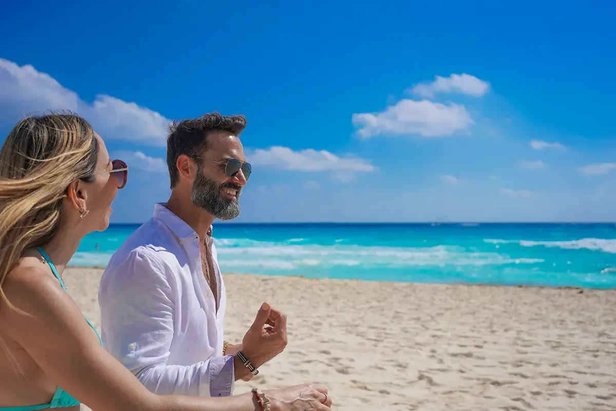 a-man-and-a-woman-talking-on-the-beach