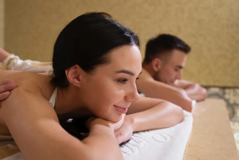 Couple-receiving-massage-at-spa